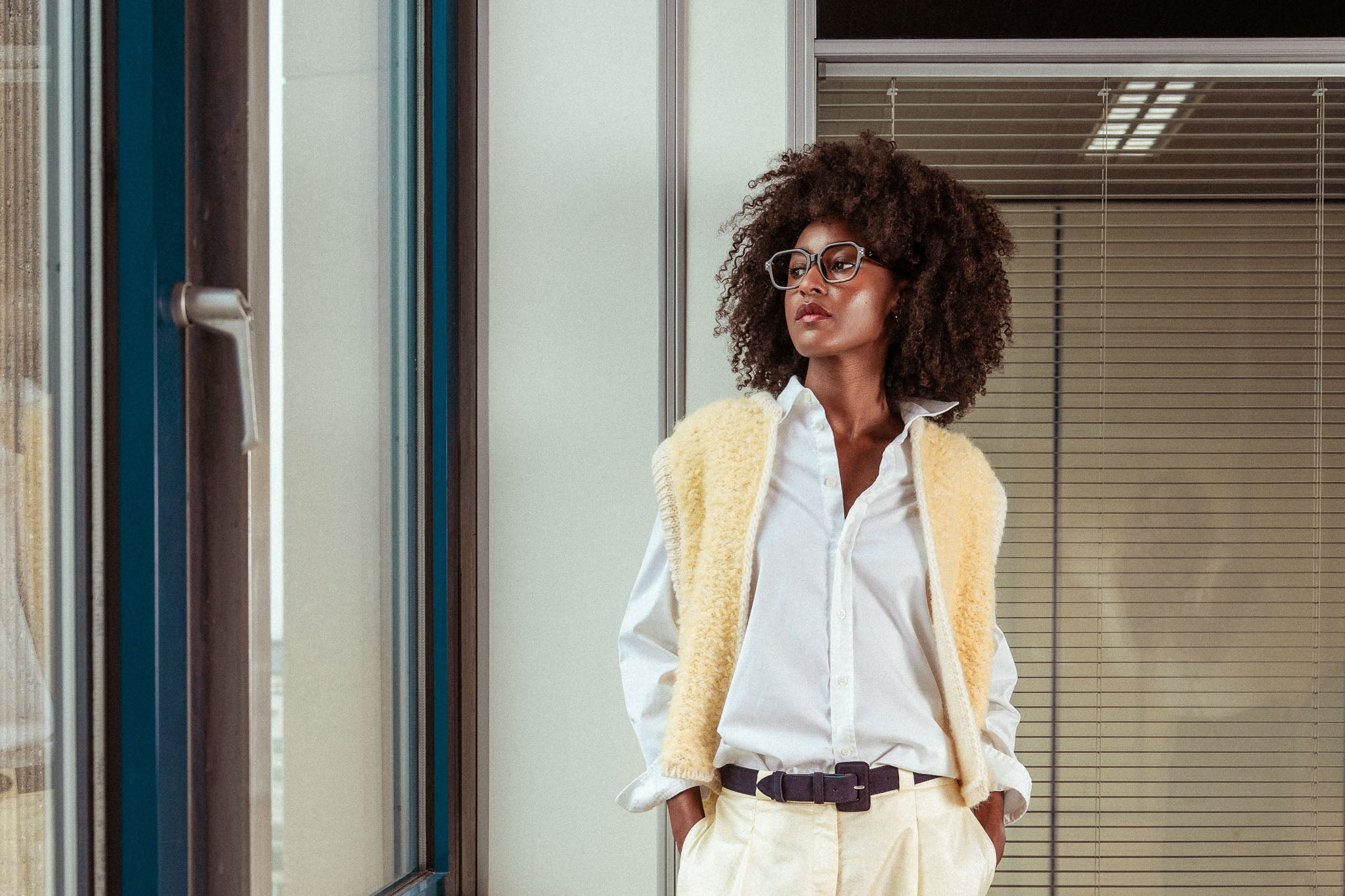 Women wearing a yellow cardigan