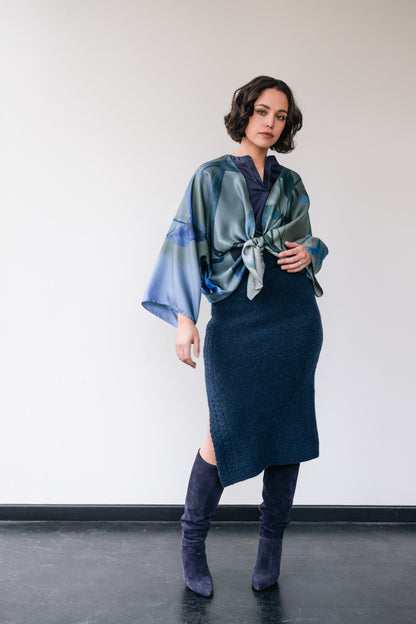 Woman wearing dark blue wool skirt and silk short kimono