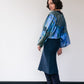 Woman wearing dark blue wool skirt and silk short kimono