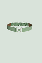 Leather buckle with elastic back and metal closure. Colour of belt is green
