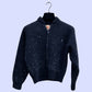 Packshot of our Odell bomber jacket in dark blue, with light blue sparkles