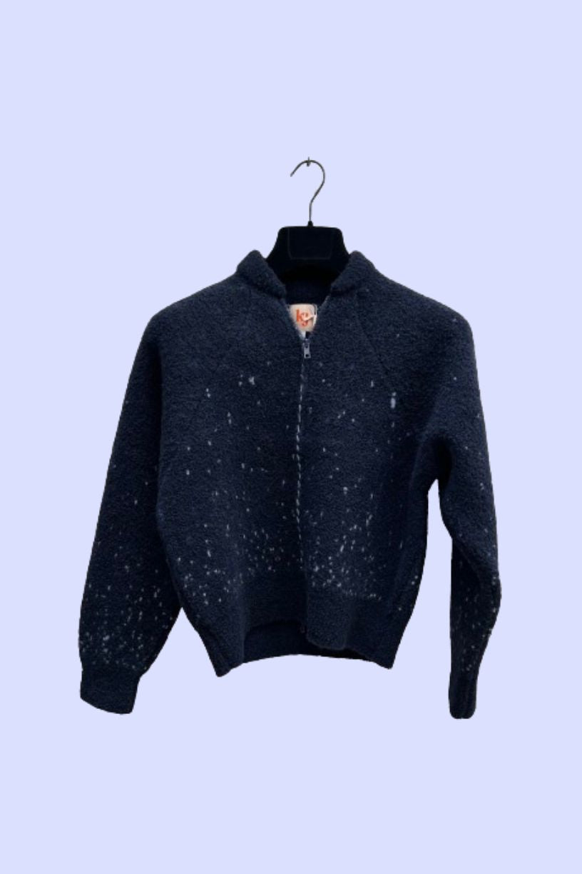 Packshot of our Odell bomber jacket in dark blue, with light blue sparkles