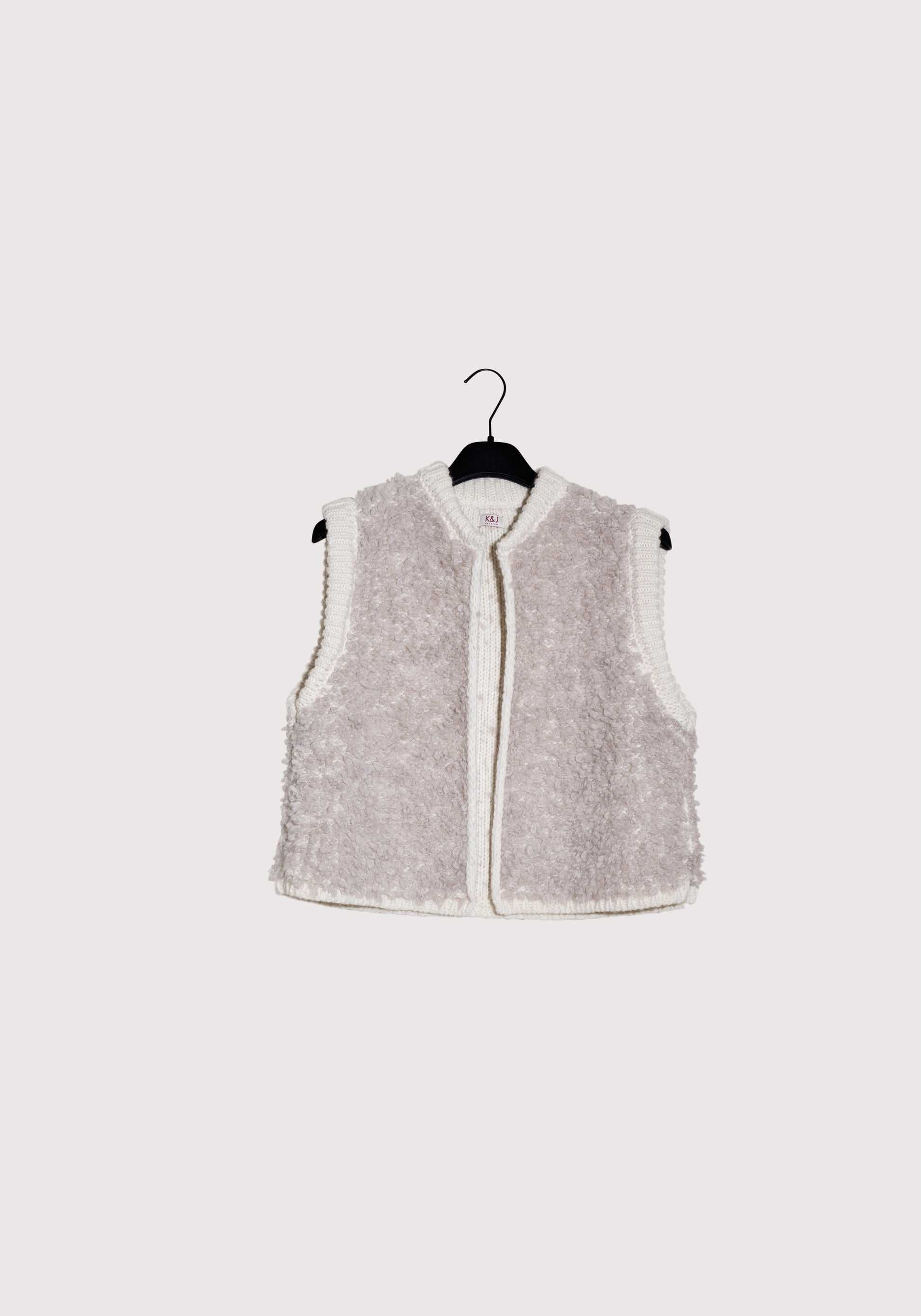 Wool beige short vest with soft details