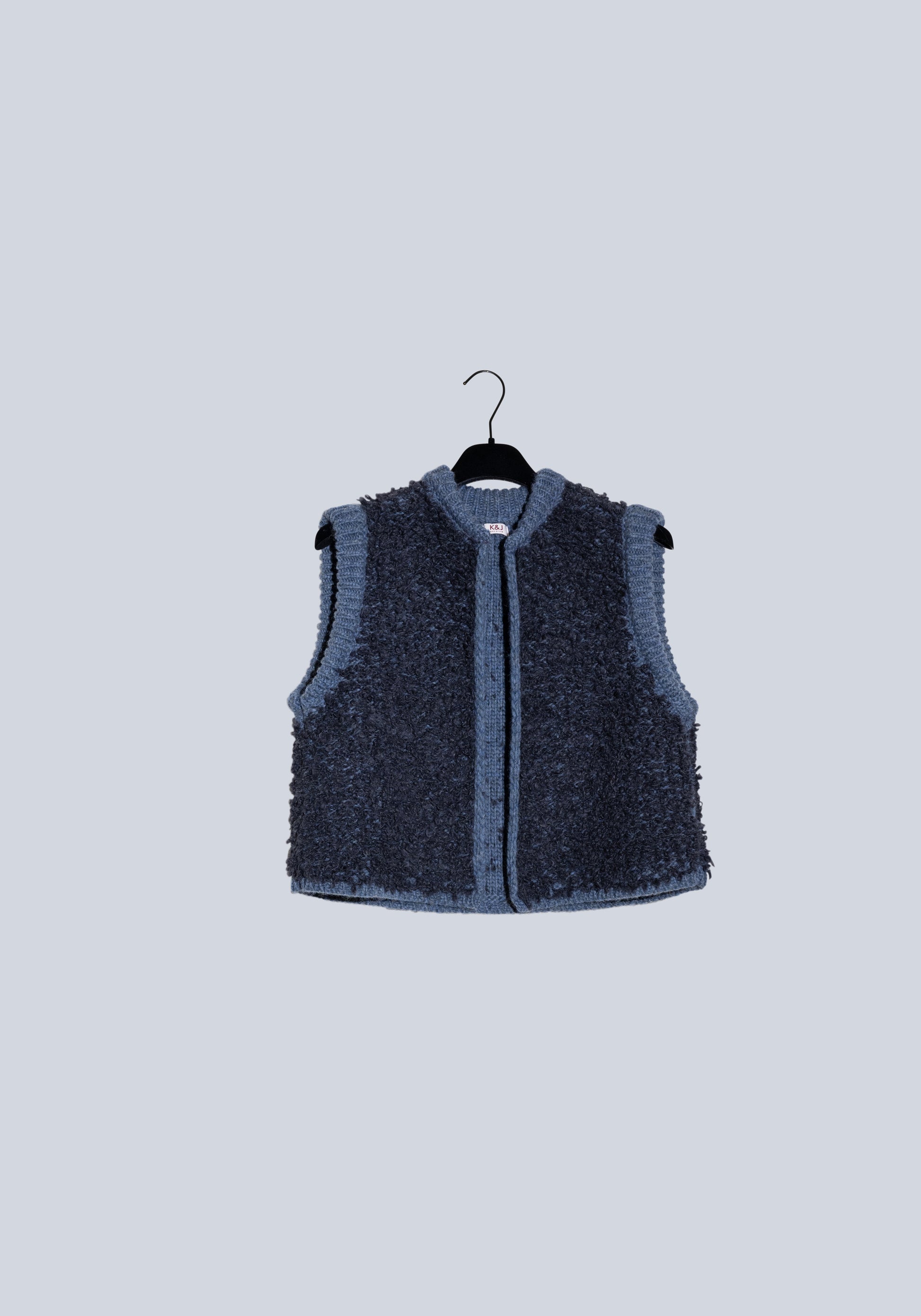 Wool dark blue short vest with soft details