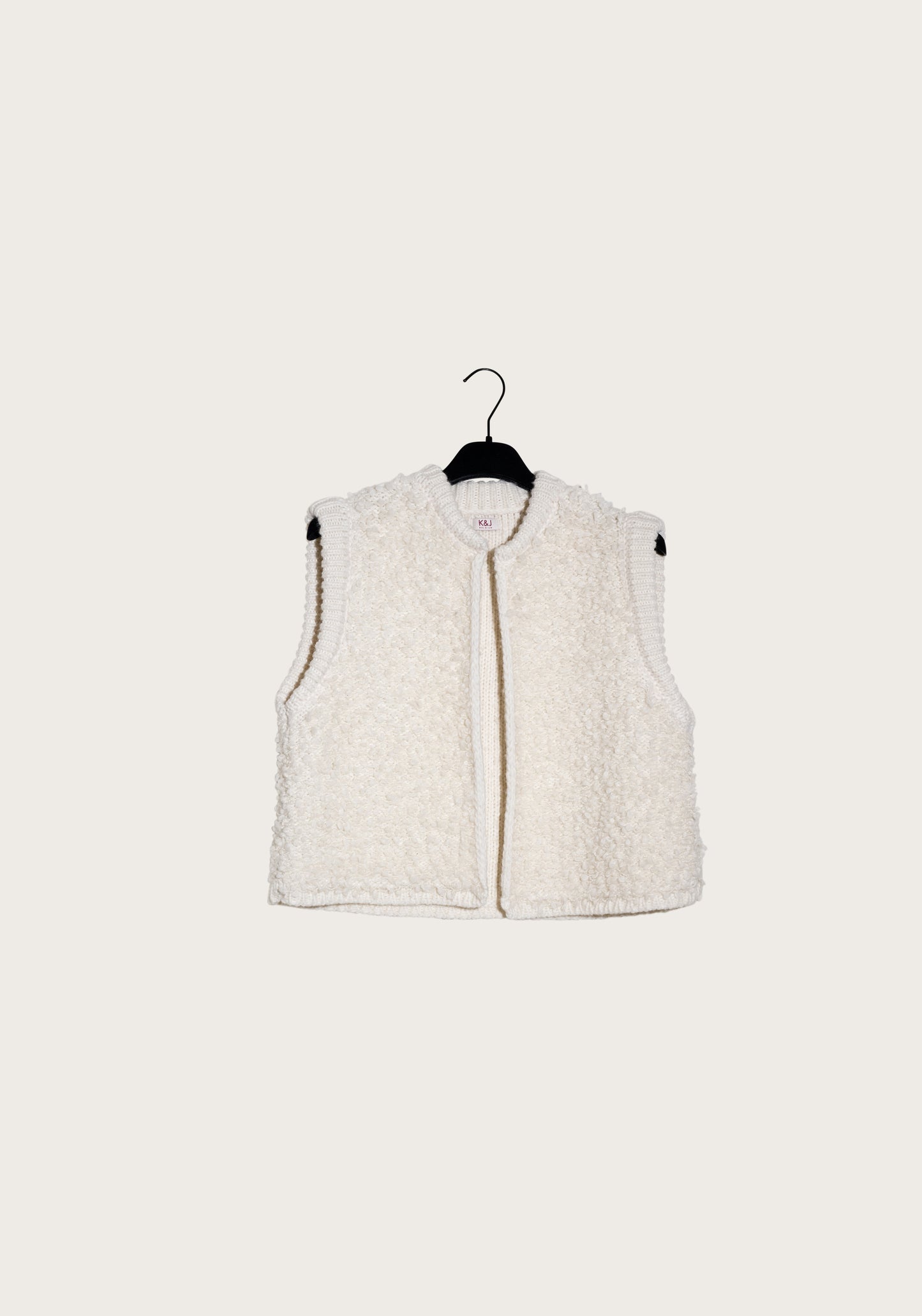 Wool white short vest with soft details