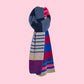 knitted scarf with lines. Main colors are beige and blue